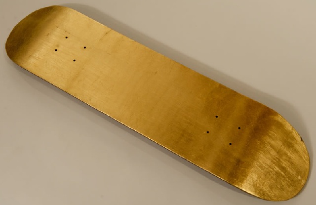 Miya-Ando-Gold-Skateboard.jpg