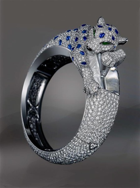 beguiling-menagerie-cartiers-nature-inspired-high-jewelry-Panther-prism-watch-in-white-gold-with-sapphires-emeralds-onyx-and-diamonds.jpg